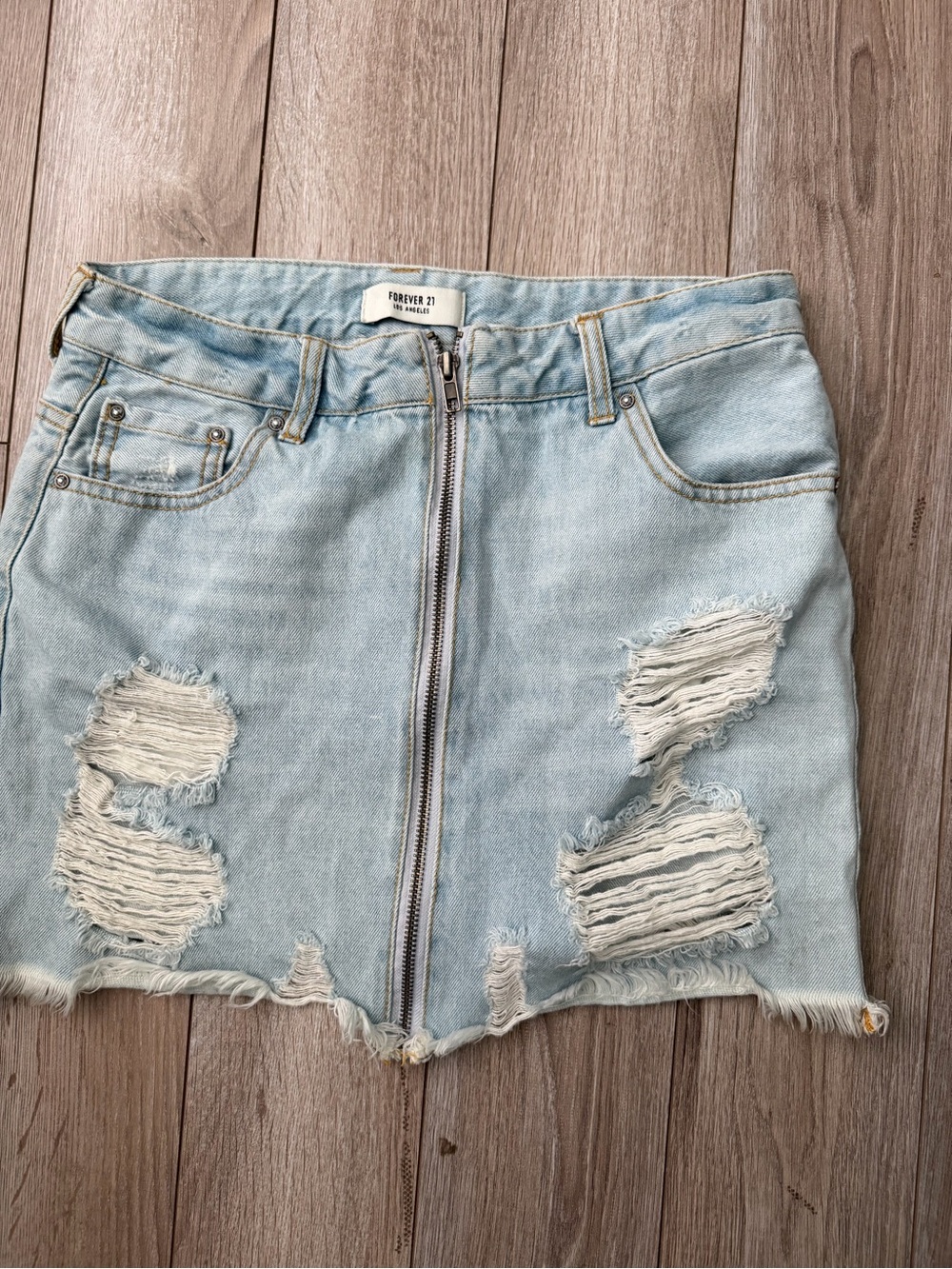 Forever 21 Light Wash Distressed Denim Mini Skirt with Front Zip